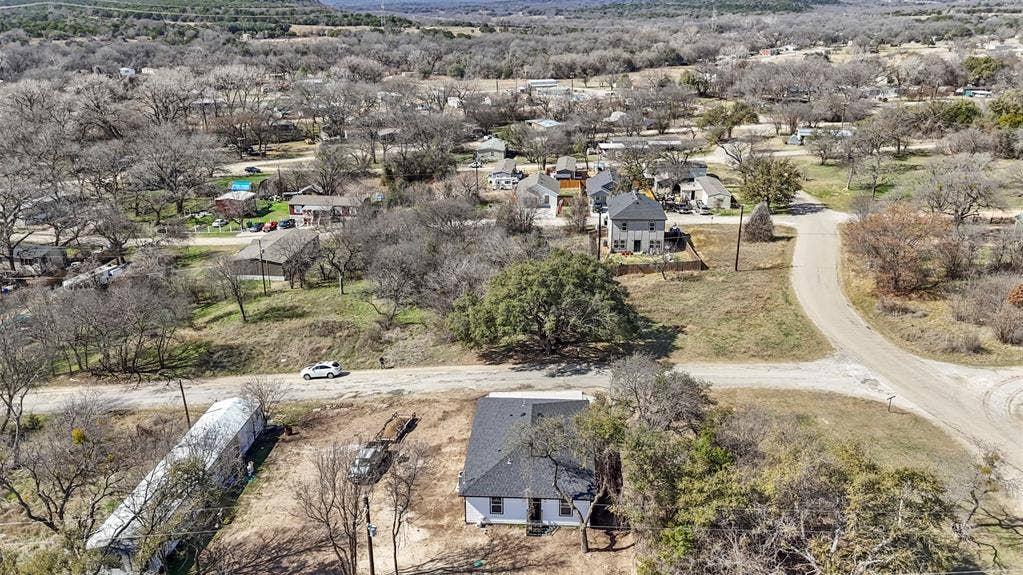 5619 Lake Granbury Trail, Granbury, TX 76048 Aerial perspective of suburban area