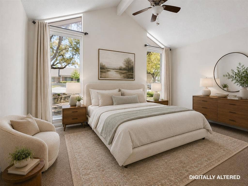 108 Wellesley Drive, Irving, TX 75062 Vaulted ceiling with a ceiling fan, two tall windows with upper transom windows, and neutral carpeting