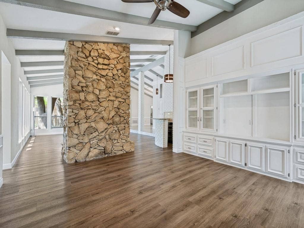 108 Wellesley Drive, Irving, TX 75062 Living room with ceiling fan, dark wood-style floors, and vaulted ceiling with beams