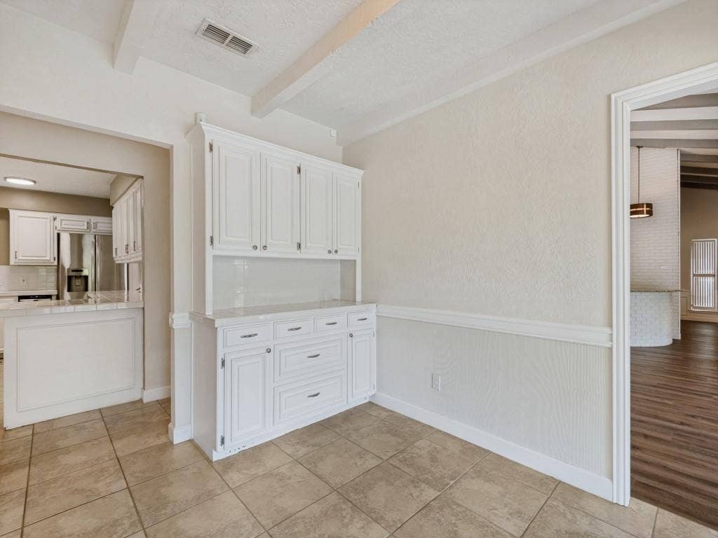 108 Wellesley Drive, Irving, TX 75062 Kitchen Dining area with view of backyard.