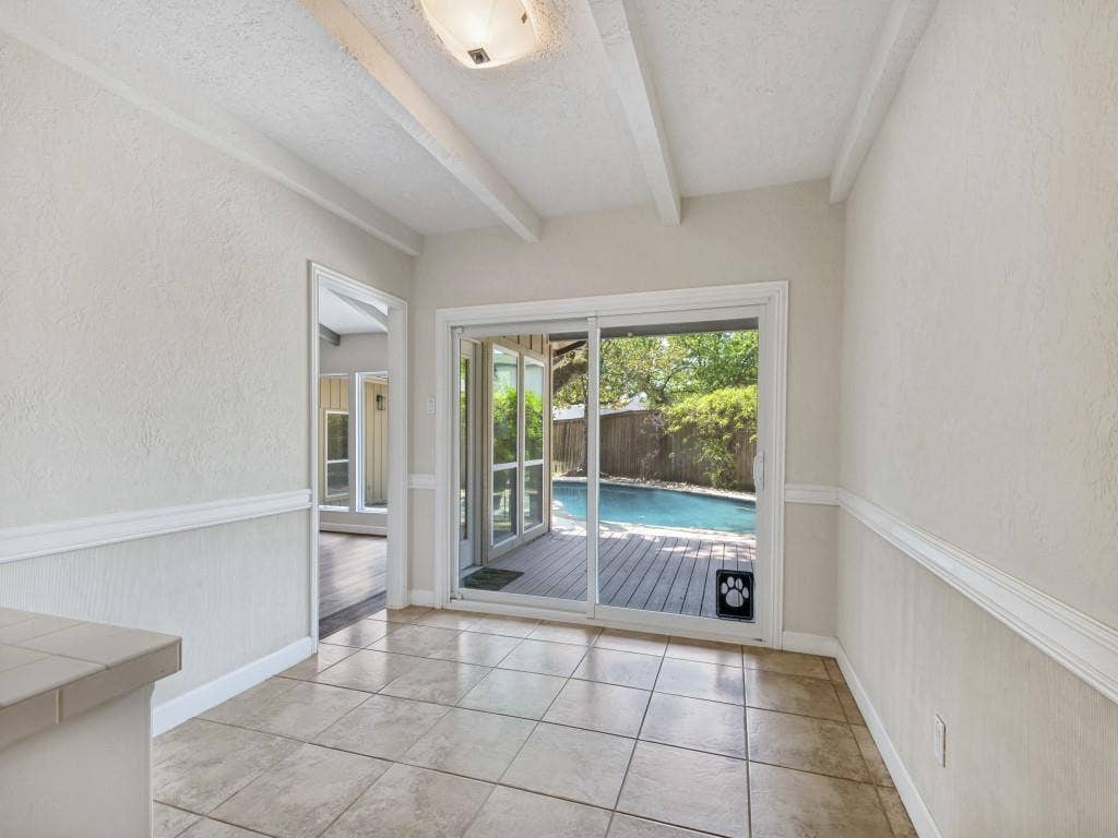 108 Wellesley Drive, Irving, TX 75062 Kitchen Dining area with view of backyard.