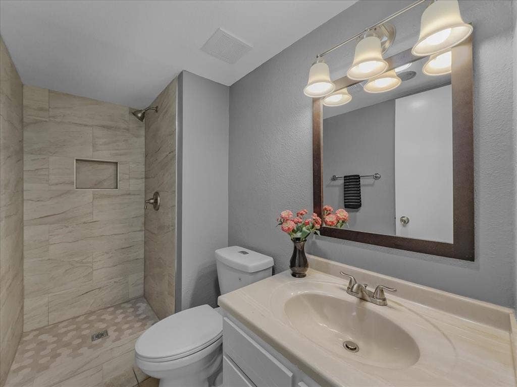 74 E Mountain Creek Court, #2, Grand Prairie, TX 75052 Downstairs with new shower stall