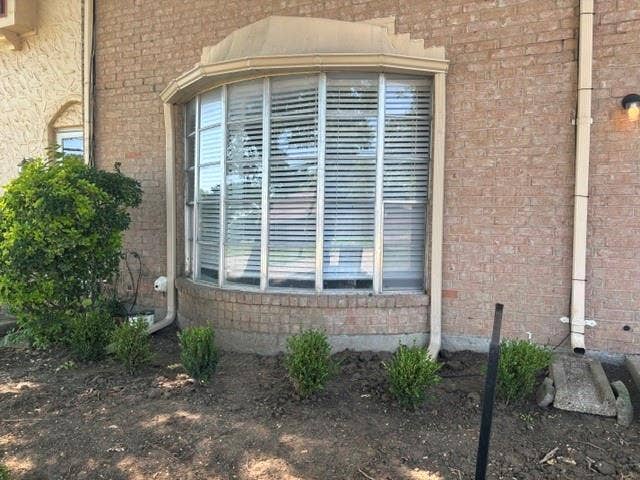 74 E Mountain Creek Court, #2, Grand Prairie, TX 75052 Bay window brings natural light into the living area