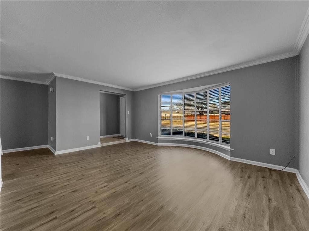 74 E Mountain Creek Court, #2, Grand Prairie, TX 75052 Spacious living area with bay window