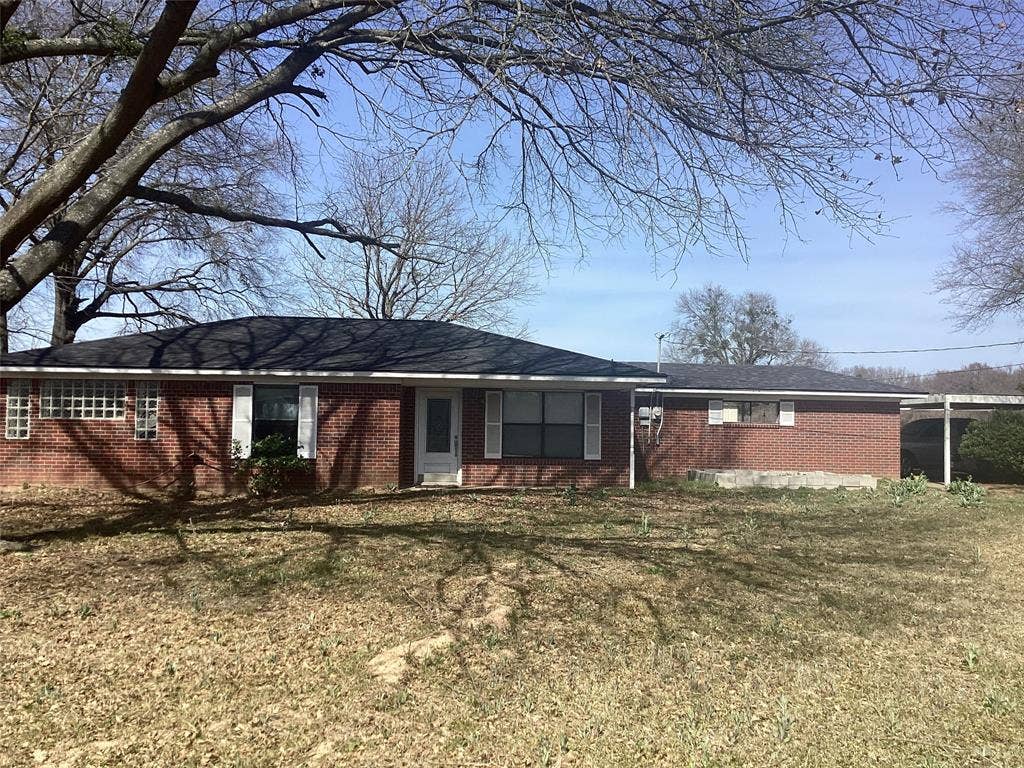 15314 Fm 3062, Malakoff, TX 75148 Main home 1202 feet per appraiser. 2 bedroom 1 full bath 1 half bath. The brick wall on the right is a covered patio. To the right of that is a 2 car carport. Primary bedroom features glass bricks. Lots of natural light. Roof about 4 yrs old