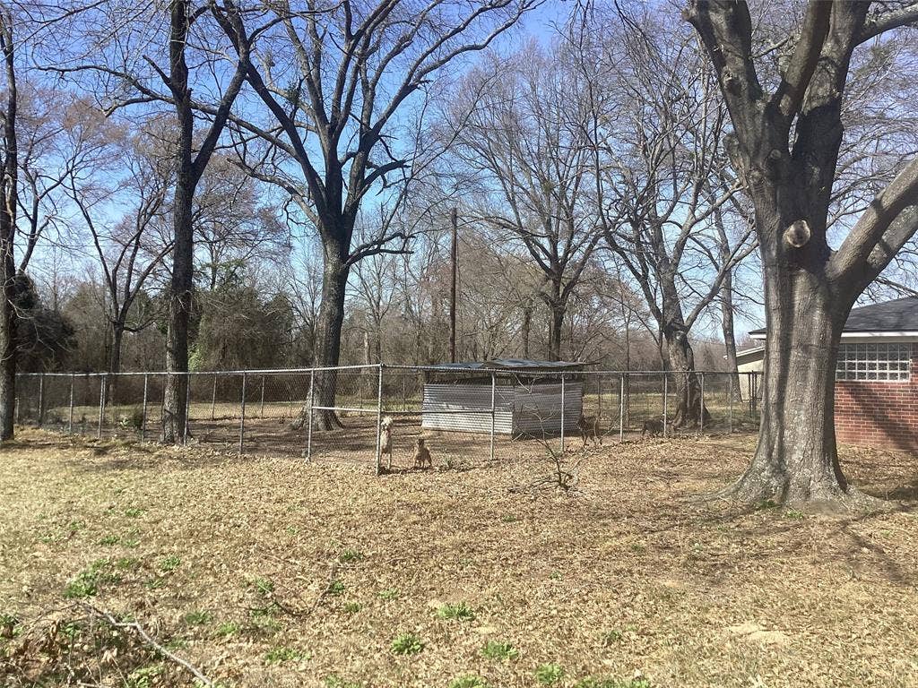 15314 Fm 3062, Malakoff, TX 75148 West side of home is a large fenced in area for dog run or chicken. Currently used for both.