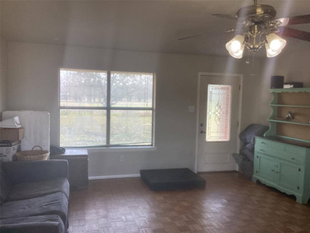 15314 Fm 3062, Malakoff, TX 75148 Living room features parquet wood tile floors and ceiling fan.