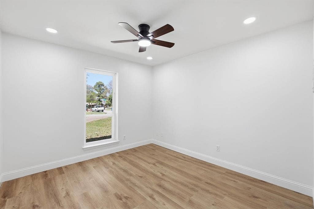2211 Sierra Drive, Grapevine, TX 76051 Empty room featuring light wood-type flooring, a ceiling fan, and recessed lighting