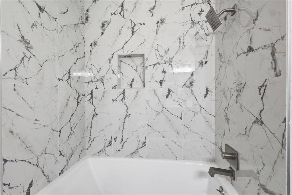 2211 Sierra Drive, Grapevine, TX 76051 Full bath featuring a combined bath / shower with marble appearance