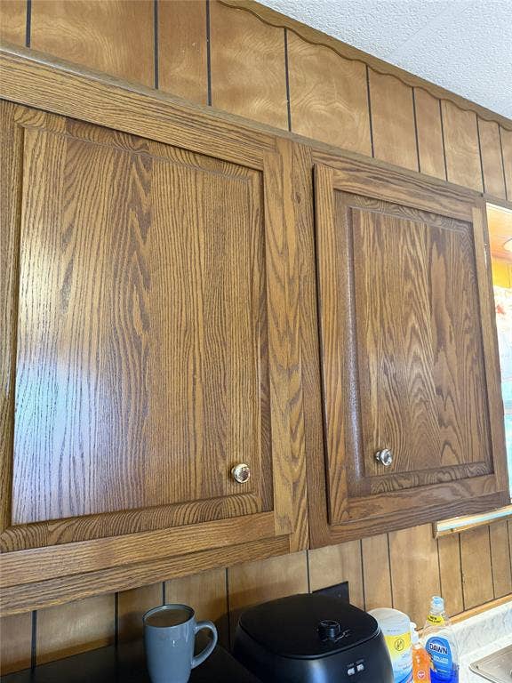 Lovely quality wood cabinetry throughout home.
