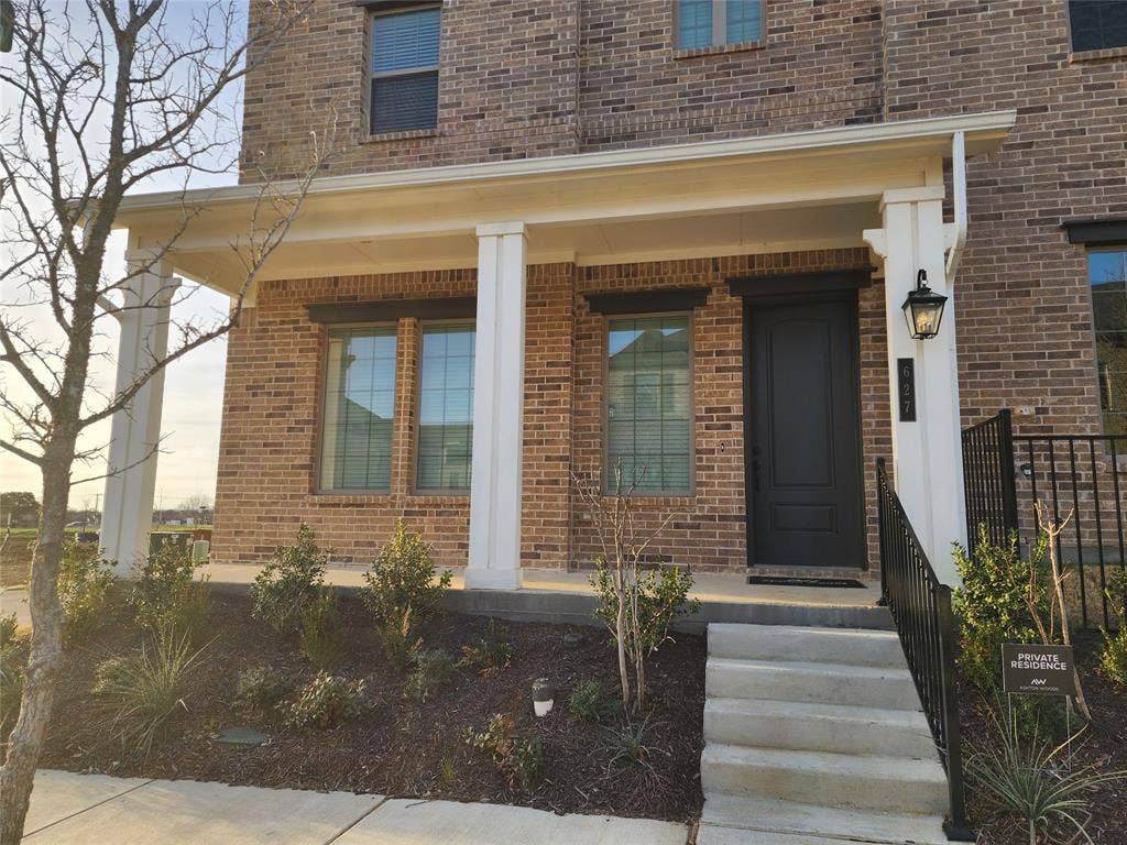 627 Redwood Way, Mansfield, TX 76063 Entrance to property with brick siding and a porch