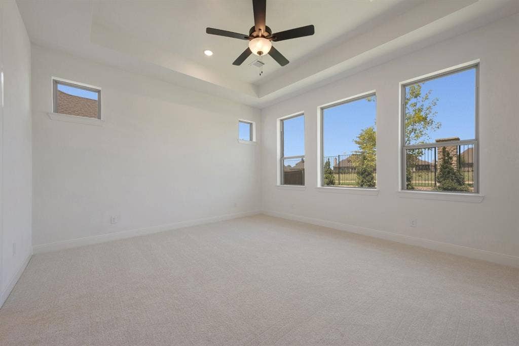3283 Jersey Drive, Midlothian, TX 76065 Spacious room featuring light-toned carpeting and multiple windows