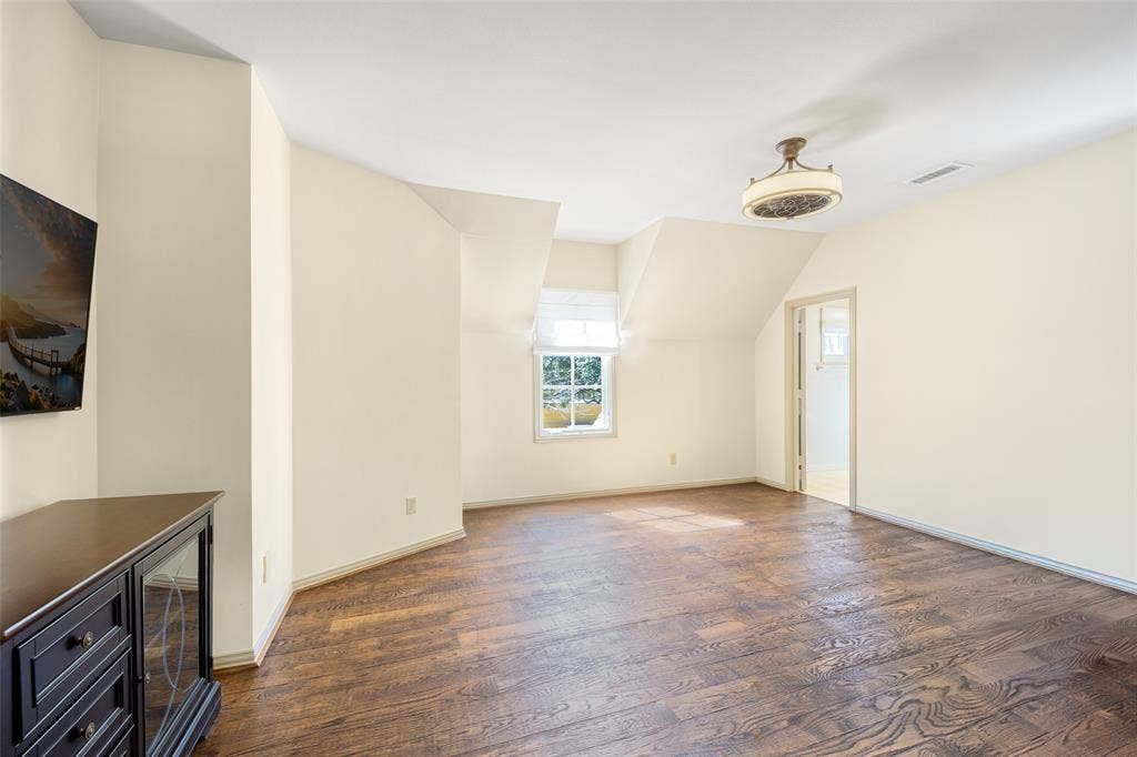 6615 Meadow Road, Dallas, TX 75230 One of the 4 upstairs bedrooms was used as a dance studio with one mirrored wall, hardwood floors, the mirror can easily be removed. An ensuite bath has been updated.
