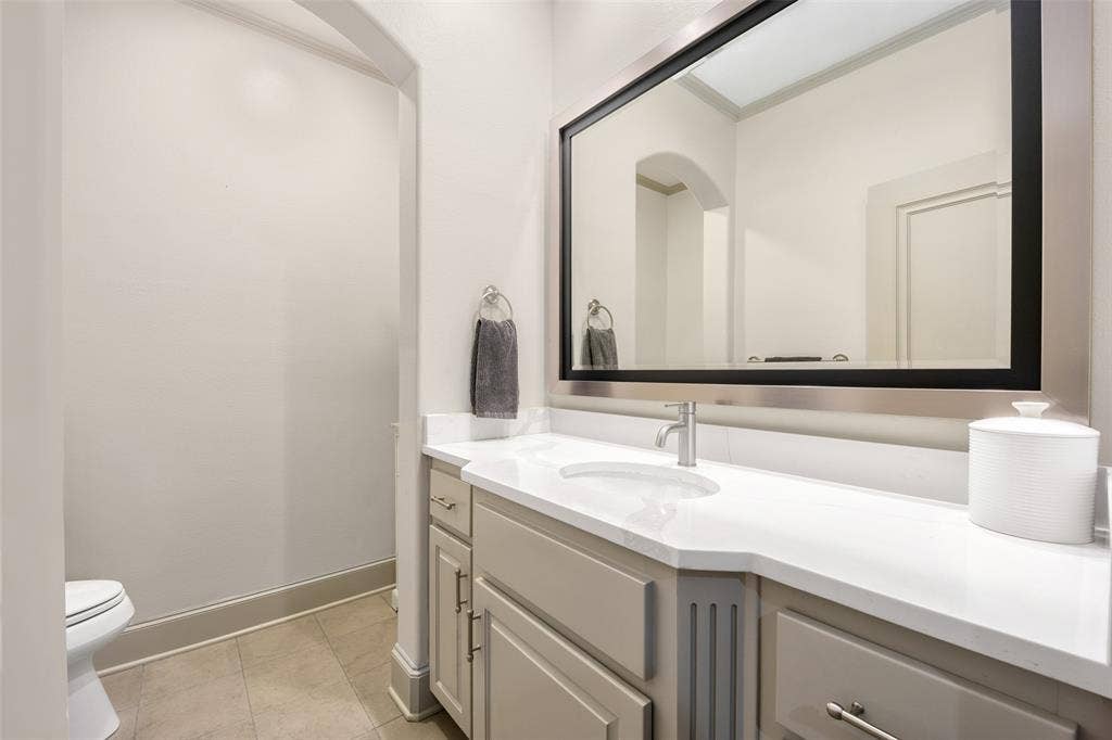6615 Meadow Road, Dallas, TX 75230 Updated upstairs guest bath off game room.