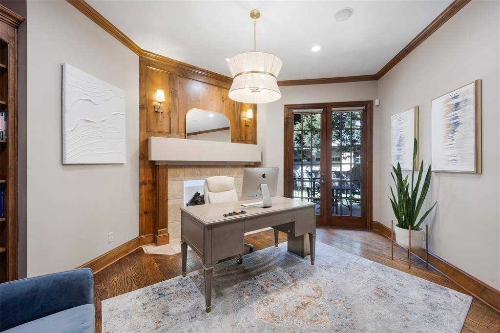 6615 Meadow Road, Dallas, TX 75230 Handsome library with built-ins, fireplace and private terrace just through the french doors.