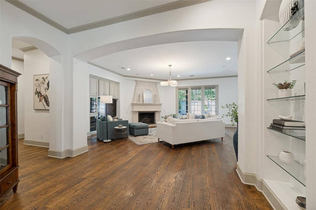 6615 Meadow Road, Dallas, TX 75230 The family room has great views and access to the heated pool and outdoor entertaining area.