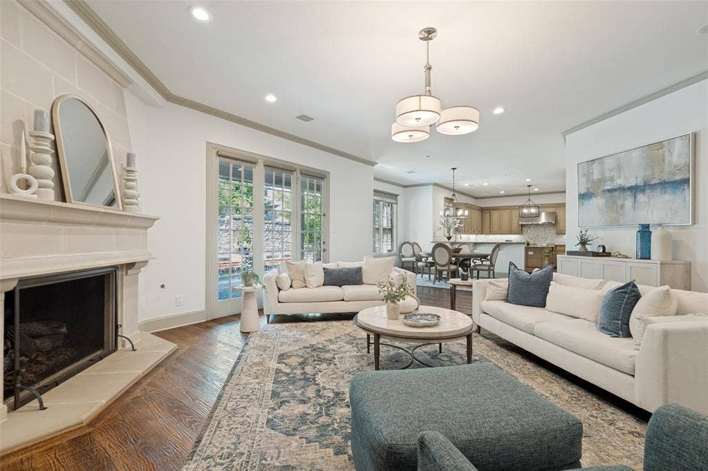 6615 Meadow Road, Dallas, TX 75230 The family room opens to the breakfast room, kitchen, bar and wine room. It is definitely the heart of the home.