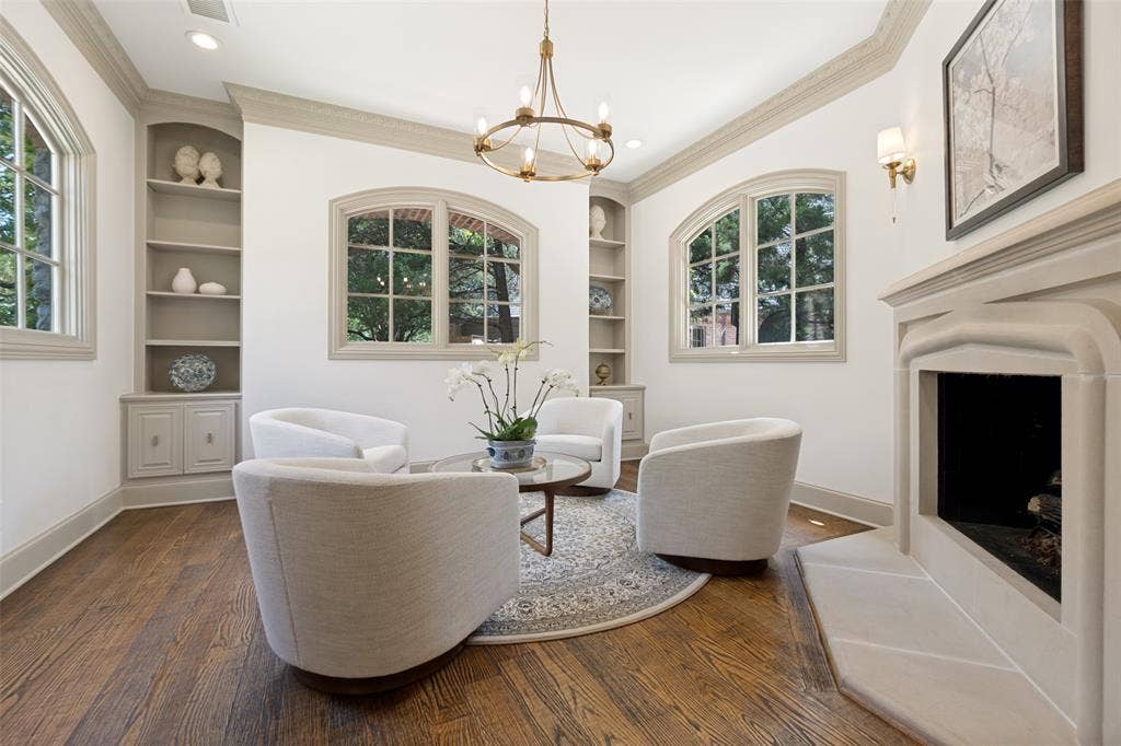 6615 Meadow Road, Dallas, TX 75230 One of the owner's favorite rooms. Upon entering this room, it calls you to sit, relax and take in the views of nature. This home could also be used as a second home office.