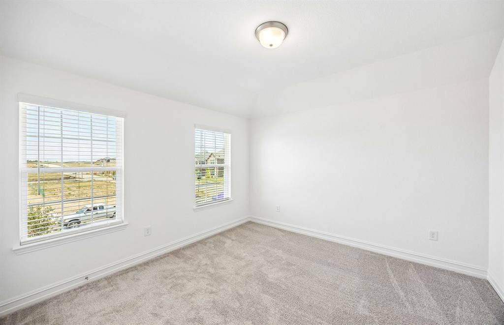 4725 Ripley Court, Celina, TX 75009 Secondary bedroom with large windows