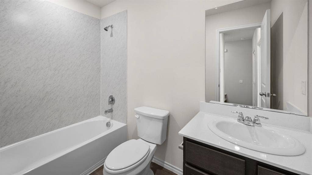 Full bathroom with vanity and shower / washtub combination