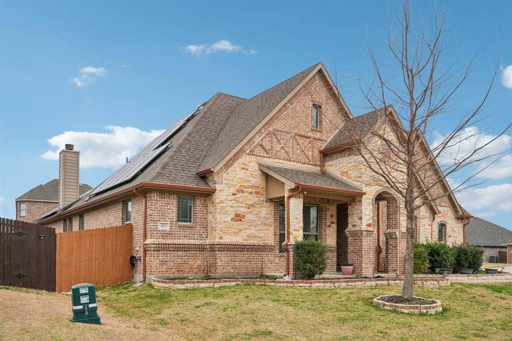 Home equipped with paid-off solar panels providing energy efficiency and long-term savings.