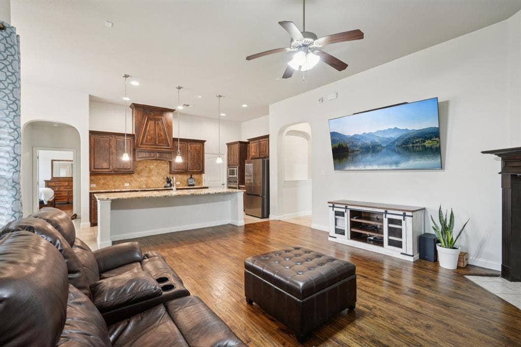 Open concept living area with seamless flow between kitchen and living room.