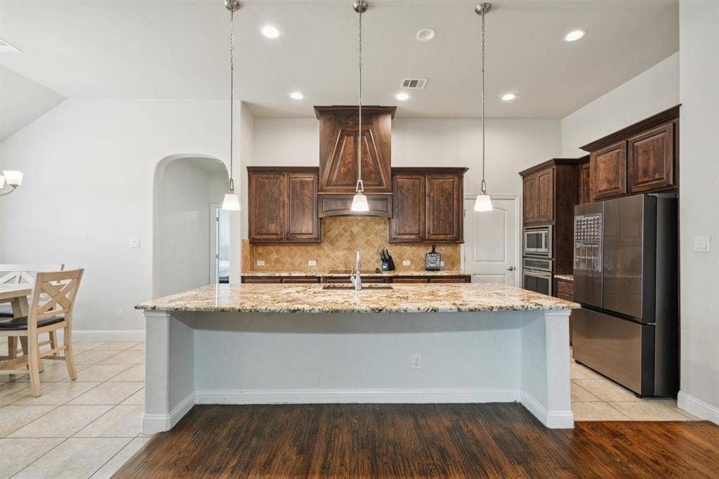 Kitchen featuring a large center island with ample counter space.