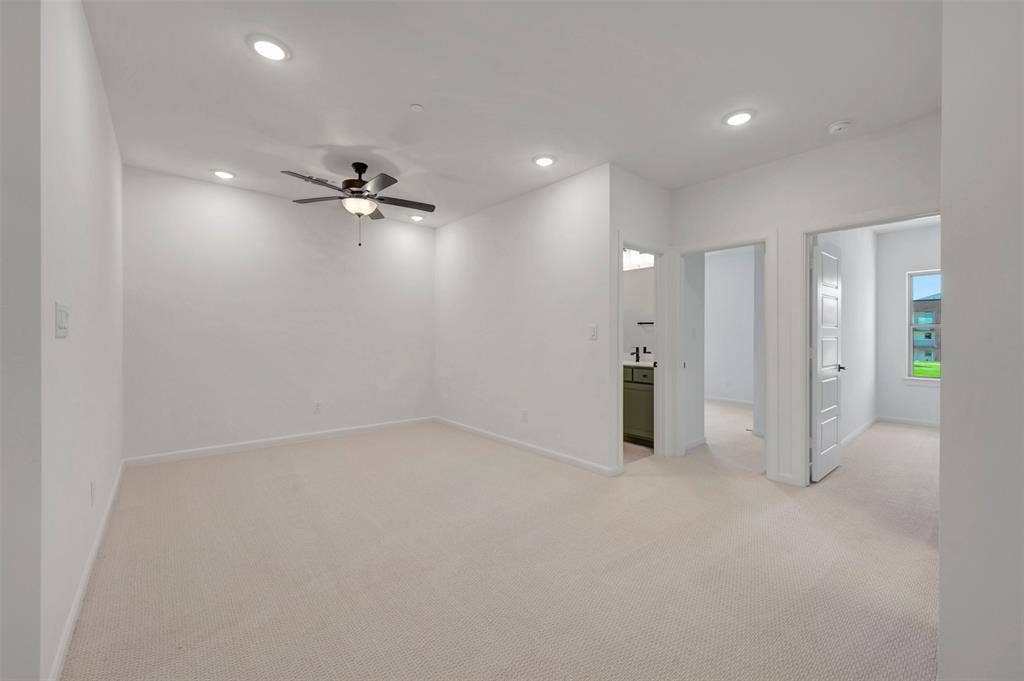 2860 Yampa Drive, McKinney, TX 75071 Spacious room featuring neutral carpet flooring, recessed lighting, and a ceiling fan