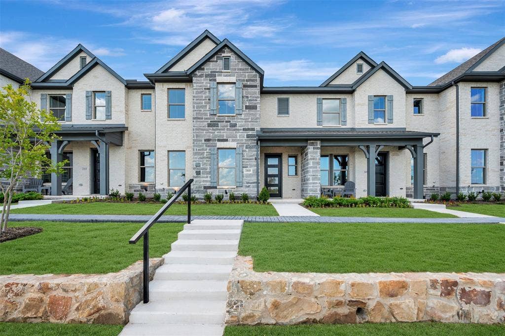 2860 Yampa Drive, McKinney, TX 75071 Modern townhome exterior featuring light-colored brick and stone accents