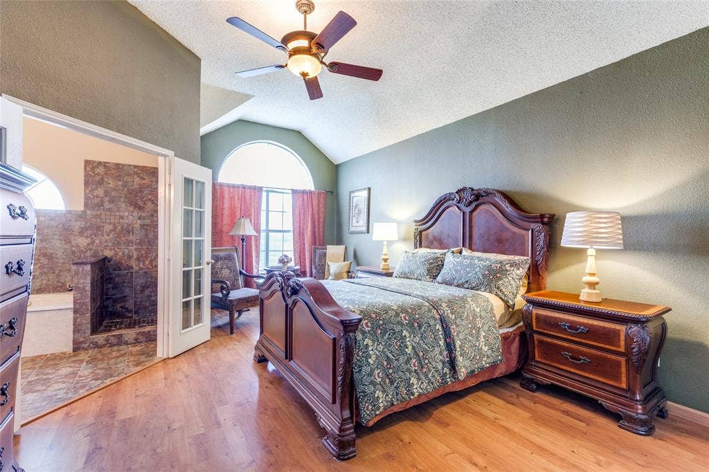 6841 Douglas Creek, Plano, TX 75023 Primary bedroom with sitting area and two walk-in closets.