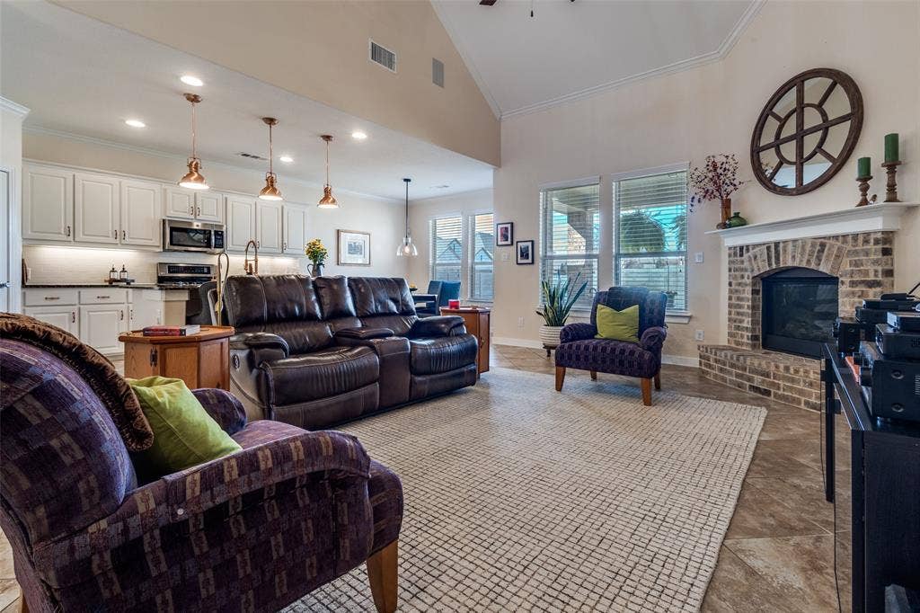 Entry leads to the a great room concept of kitchen, breakfast room and living room