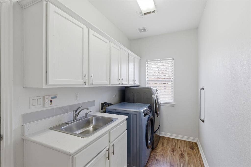 Laundry room includes washer and dryer