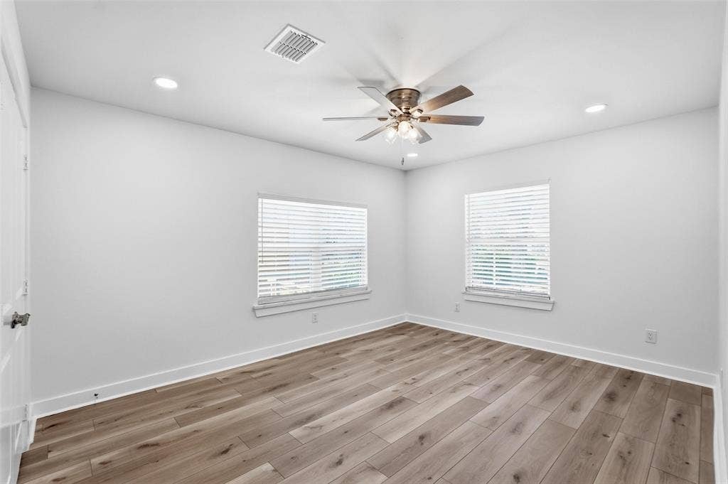 2518 W Amherst Avenue, Dallas, TX 75235 Luxury vinyl plank flooring throughout for a seamless, modern look and easy maintenance.