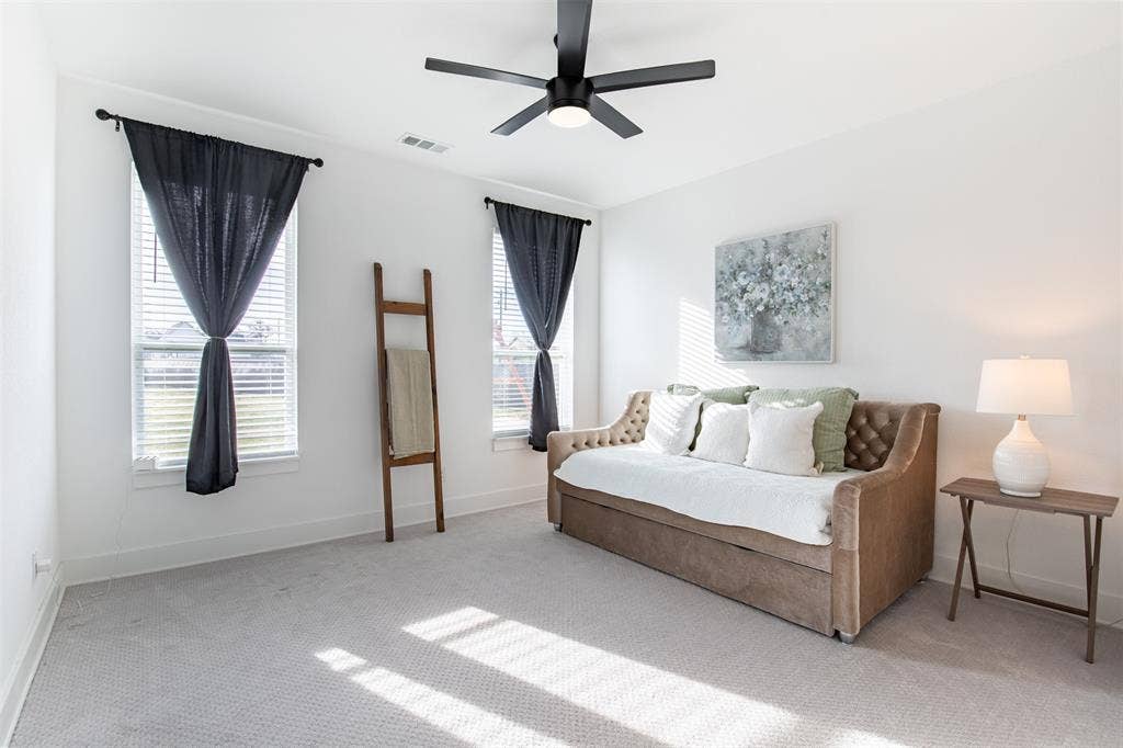111 Bluegrass Trail, Springtown, TX 76082 Secondary bedroom with natural light overlooking the backyard.