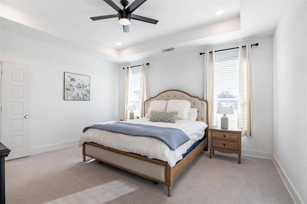 111 Bluegrass Trail, Springtown, TX 76082 Primary suite exudes relaxation with trey ceiling and natural light.