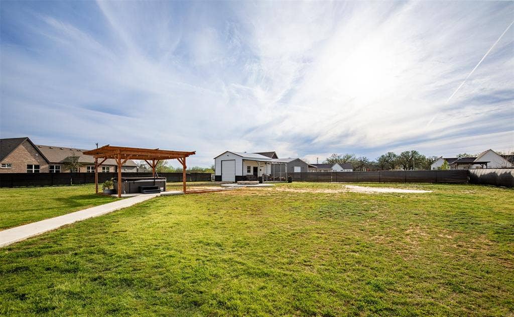 111 Bluegrass Trail, Springtown, TX 76082 Stunning backyard view of Texas skies.