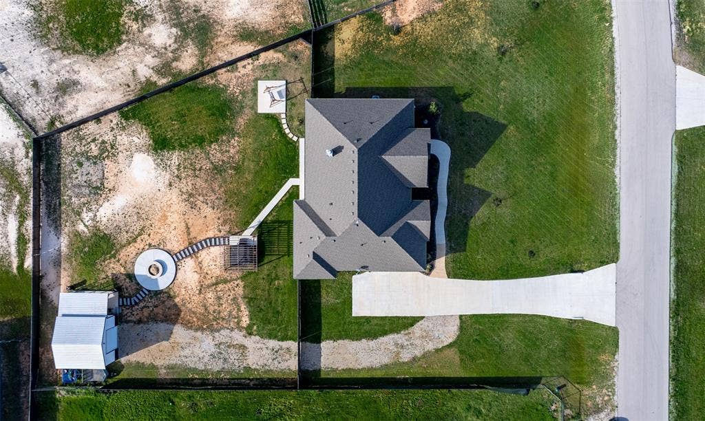 111 Bluegrass Trail, Springtown, TX 76082 Aerial view of home and lot.