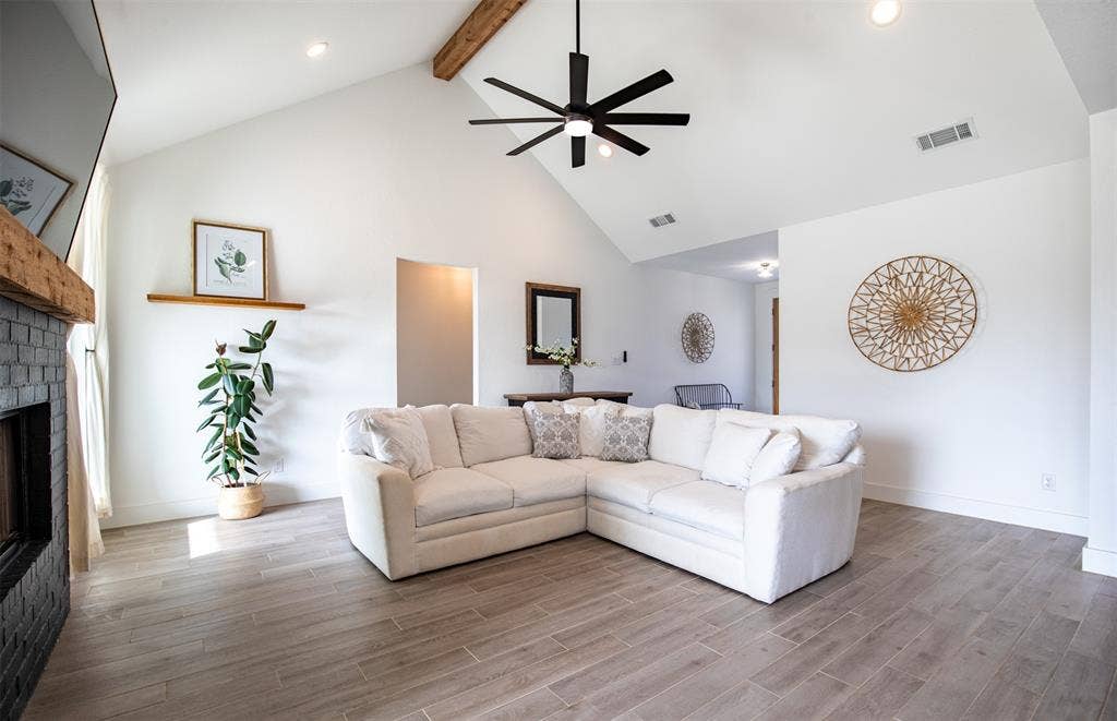 111 Bluegrass Trail, Springtown, TX 76082 Cozy living room with vaulted, beam ceiling.