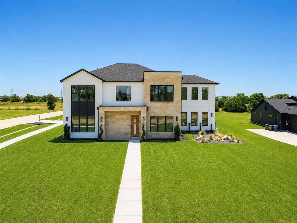 436 Whispering Way, Red Oak, TX 75154 listing photos have been digitally enhanced such as grass color. Actual property grass conditions may vary.