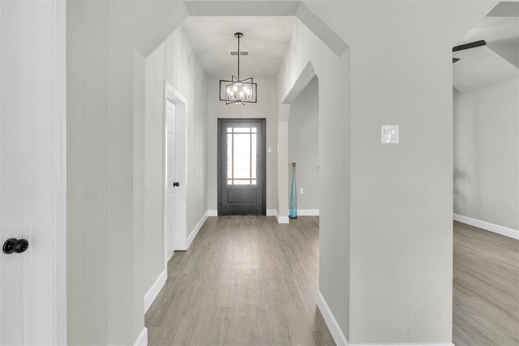 3415 Fm 3211, Caddo Mills, TX 75135 Entryway with suspended lighting and light wood-style flooring