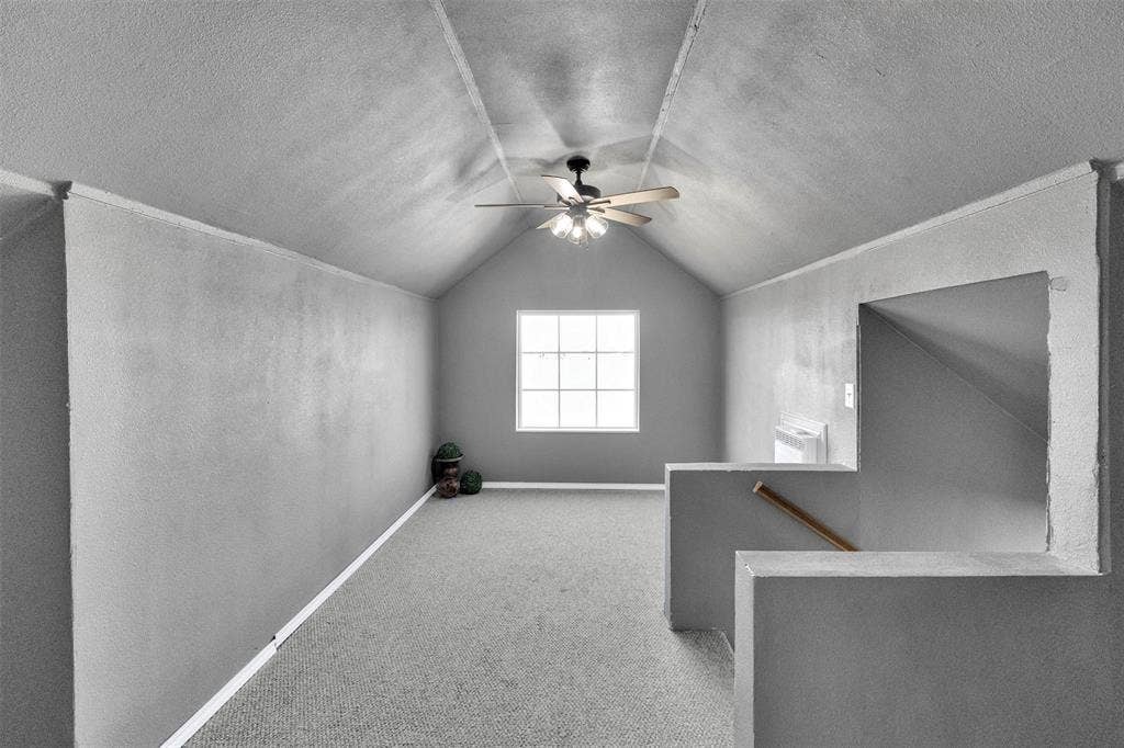 3415 Fm 3211, Caddo Mills, TX 75135 Bonus room featuring light carpet, a textured ceiling, a ceiling fan, and a textured wall