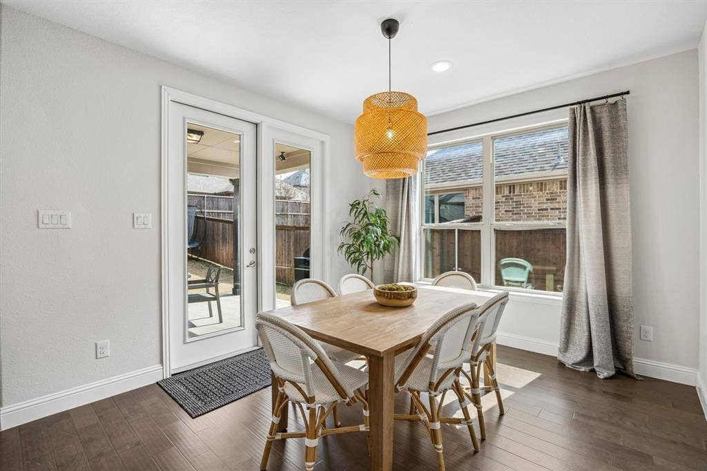 13674 Carmenita Drive, Frisco, TX 75035 Dining area featuring dark wood finished floors