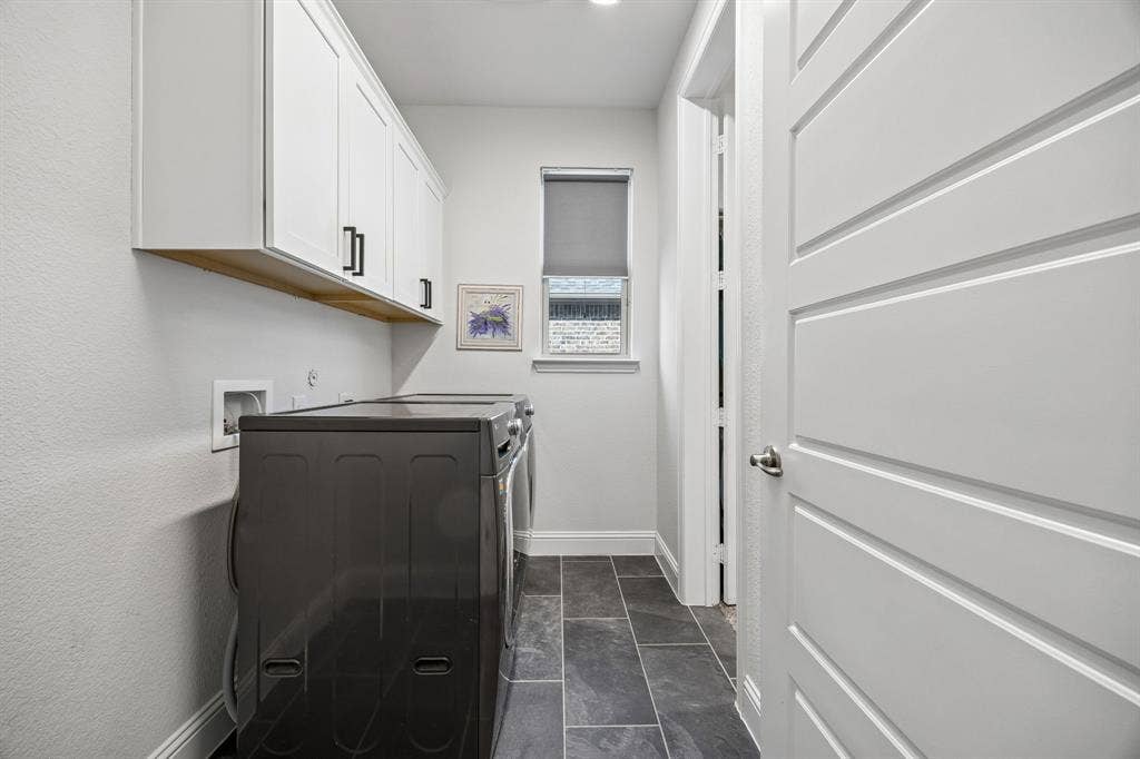13674 Carmenita Drive, Frisco, TX 75035 Laundry area with cabinet space and washer hookup. Walk-in Closet is connected to Utility room
