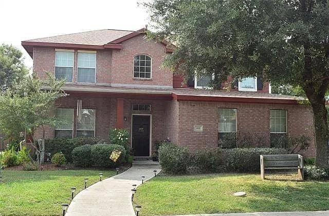 103 Denali Court, Terrell, TX 75160 Traditional-style home with brick siding and a front lawn