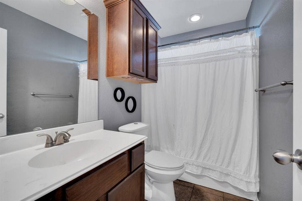 160 Berkshire Lane, Waxahachie, TX 75165 Bedroom with a desk and light wood-style floors