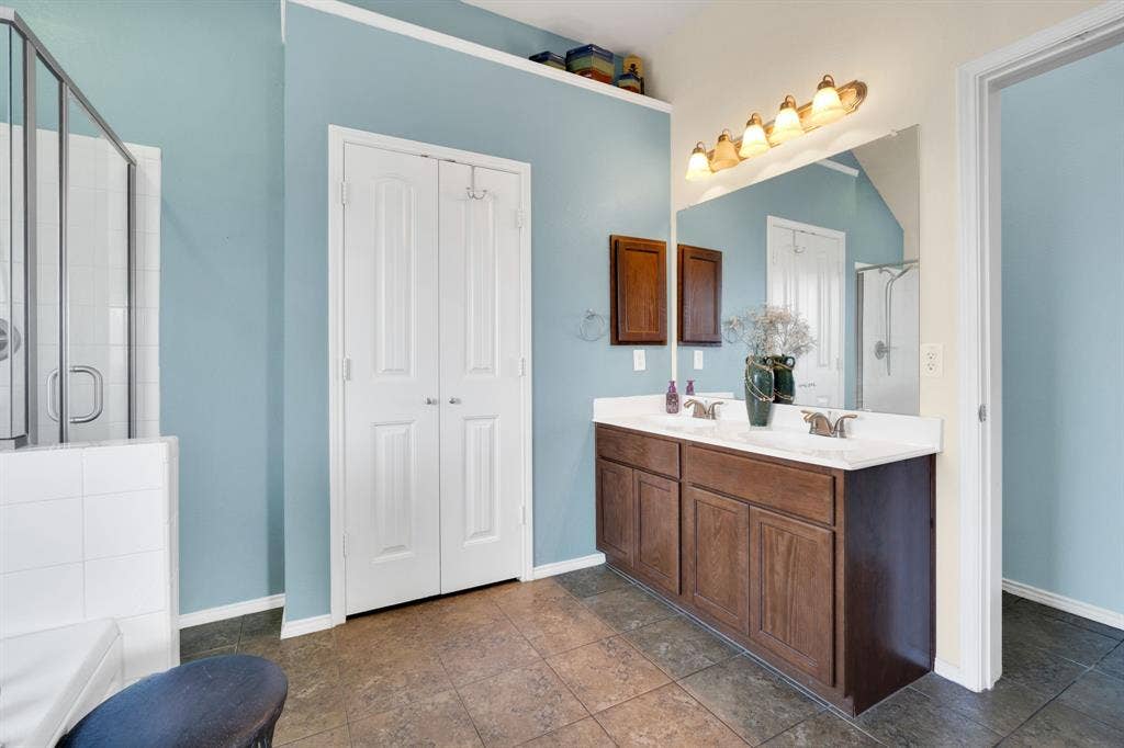 160 Berkshire Lane, Waxahachie, TX 75165 Bedroom featuring dark wood-style floors and ceiling fan