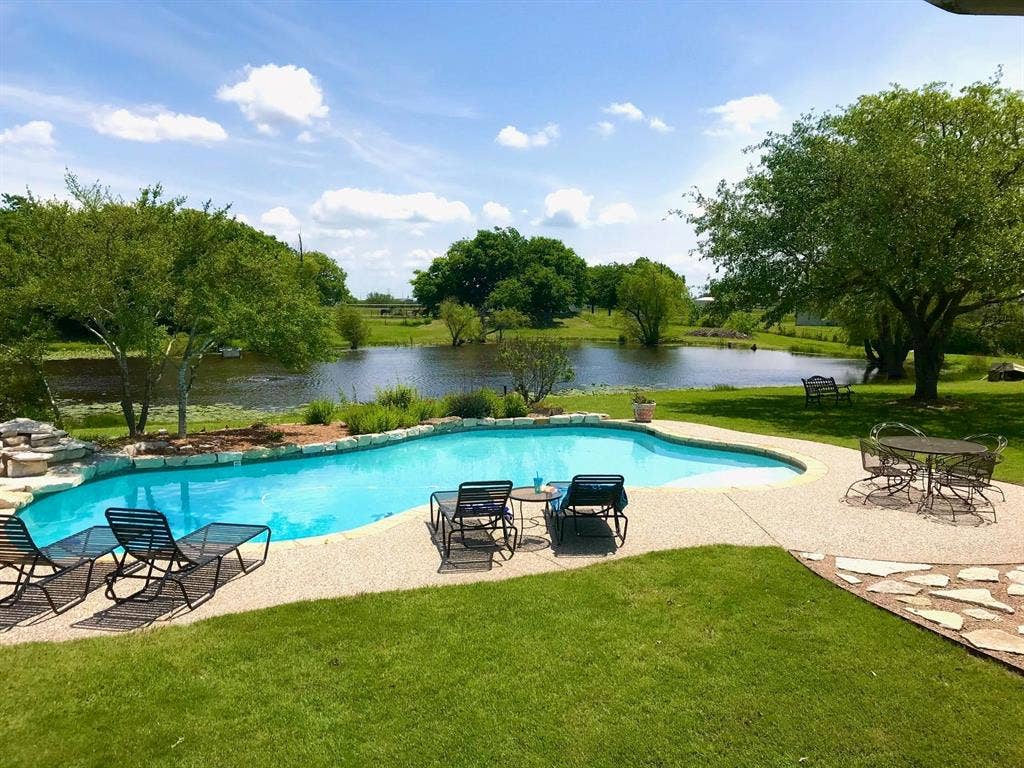 535 Cullins Road E, Rockwall, TX 75032 Property has mature trees & a picturesque 1.5-acre, stocked fishing pond
