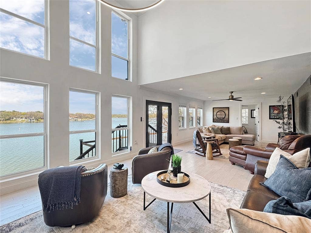 4401 Clarke Drive, Fort Worth, TX 76135 Tons of family room space with Epic views of the Lake!