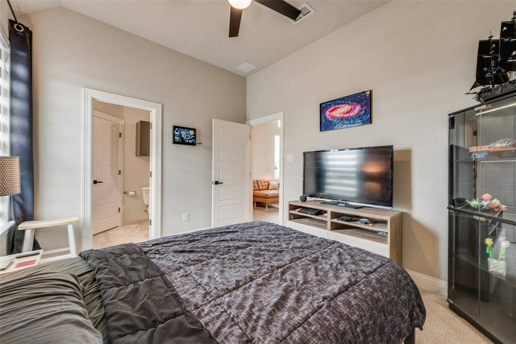 7108 Woodside Drive, Argyle, TX 76226 bedroom with ensuite bathroom and walk in closet