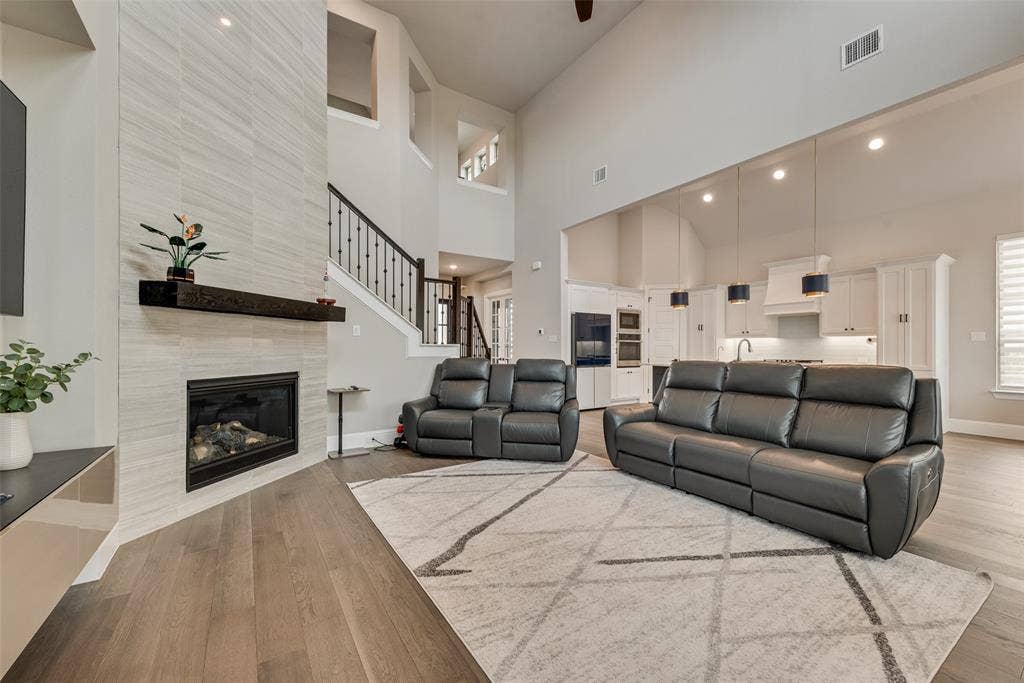 7108 Woodside Drive, Argyle, TX 76226 Open floorplan, high ceiling, gorgeous woodfloor throughout.